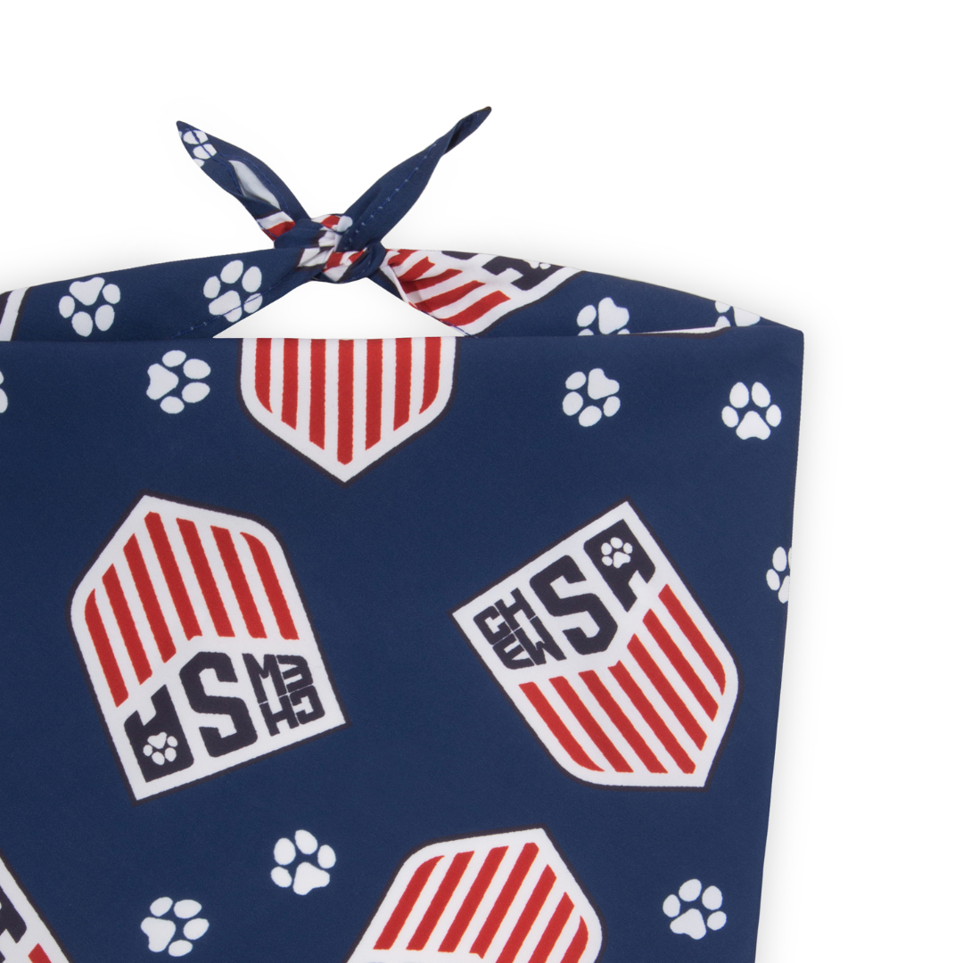 Navy blue soccer bandana with red and white ChewSA shield logos and paw prints on a white background