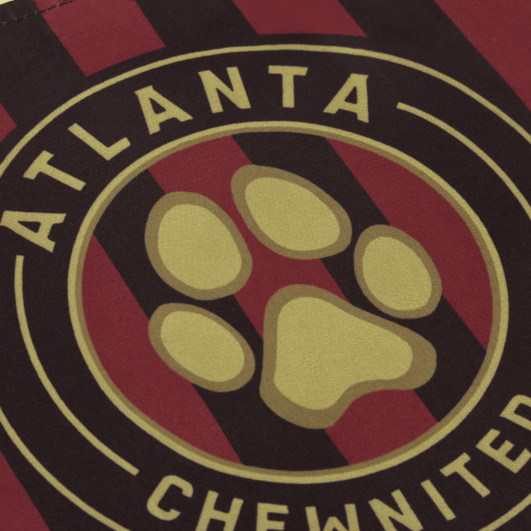 Close up, striped Atlanta parody dog bandana featuring a stylish soccer-inspired design, perfect for sporty pups and unique soccer gifts for dog-loving soccer fans