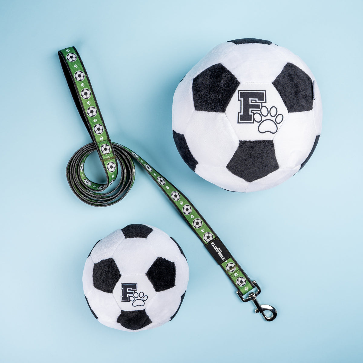 Floofball soccer dog collection featuring plush soccer ball dog toys and a green soccer print dog leash.